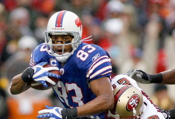 ORCHARD PARK, NY - NOVEMBER 30: Lee Evans #83  of the Buffalo Bills is tackled by Walt Harris #27 of the San Francisco 49ers  on November 30, 2008 at Ralph Wilson Stadium in Orchard Park, New York.  (Photo by Rick Stewart/Getty Images)
