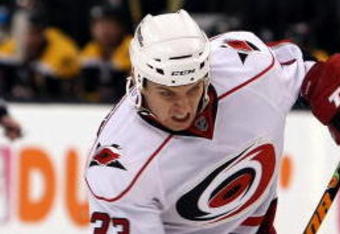 BOSTON - MAY 03:  Anton Babchuk #33 of the Carolina Hurricanes takes a shot in the second period against the Boston Bruins during Game Two of the Eastern Conference Semifinal Round of the 2009 Stanley Cup Playoffs on May 3, 2009 at the TD Banknorth Garden in Boston, Massachusetts.  (Photo by Elsa/Getty Images)
