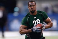 INDIANAPOLIS, IN - FEBRUARY 23:  Defensive lineman Mike Johnson of Georgia Tech runs during the NFL Scouting Combine presented by Under Armour at Lucas Oil Stadium on February 23, 2009 in Indianapolis, Indiana. (Photo by Scott Boehm/Getty Images)
