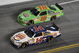 DAYTONA BEACH, FL - JULY 04: Tony Stewart, driver of the #14 Burger King Chevrolet, leads Kyle Busch, driver of the #18 Interstate Battereis Toyota, during the NASCAR Sprint Cup Series 51st Annual Coke Zero 400 at Daytona International Speedway on July 4, 2009 in Daytona Beach, Florida.  (Photo by John Harrelson/Getty Images for NASCAR)