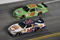 DAYTONA BEACH, FL - JULY 04: Tony Stewart, driver of the #14 Burger King Chevrolet, leads Kyle Busch, driver of the #18 Interstate Battereis Toyota, during the NASCAR Sprint Cup Series 51st Annual Coke Zero 400 at Daytona International Speedway on July 4, 2009 in Daytona Beach, Florida.  (Photo by John Harrelson/Getty Images for NASCAR)
