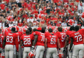 ATHENS, GA - OCTOBER 11: The Georgia Bulldogs huddle on the field before the game against the Tennessee Volunteers at Sanford Stadium on October 11, 2008 in Athens, Georgia.  (Photo by Kevin C. Cox/Getty Images)