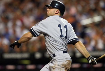 NEW YORK - JUNE 26:  Brett Gardner #11 of the New York Yankees follows through on a second-inning base hit against the New York Mets on June 26, 2009 at Citi Field in the Flushing neighborhood of the Queens borough of New York City.  (Photo by Jim McIsaac/Getty Images)