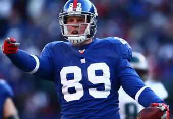 EAST RUTHERFORD, NJ -  JANUARY 11:  Kevin Boss #89 of the New York Giants gestures against the Philadelphia Eagles during the NFC Divisional Playoff Game on January 11, 2009 at Giants Stadium in East Rutherford, New Jersey.  The Eagles defeated the Giants 23 -11. (Photo by Chris McGrath/Getty Images)