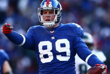 EAST RUTHERFORD, NJ -  JANUARY 11:  Kevin Boss #89 of the New York Giants gestures against the Philadelphia Eagles during the NFC Divisional Playoff Game on January 11, 2009 at Giants Stadium in East Rutherford, New Jersey.  The Eagles defeated the Giants 23 -11. (Photo by Chris McGrath/Getty Images)