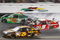 DAYTONA BEACH, FL - JULY 04:  Kasey Kahne, driver of the #9 Budweiser Dodge, crashes into the rear of Kyle Busch, driver of the #18 Interstate Batteries Toyota, after Kyle hit the wall on the final lap during the NASCAR Sprint Cup Series 51st Annual Coke Zero 400 at Daytona International Speedway on July 4, 2009 in Daytona Beach, Florida.  (Photo by Geoff Burke/Getty Images for NASCAR)