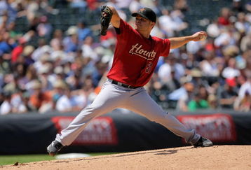 DENVER - MAY 14:  Starting pitcher Wandy Rodriguez #51 of the Houston Astros delivers against the Colorado Rockies during MLB action at Coors Field on May 14, 2009 in Denver, Colorado.  (Photo by Doug Pensinger/Getty Images)