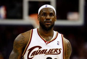 CLEVELAND - MAY 28:  LeBron James #23 of the Cleveland Cavaliers looks on between plays against the Orlando Magic in Game Five of the Eastern Conference Finals during the 2009 Playoffs at Quicken Loans Arena on May 28, 2009 in Cleveland, Ohio. NOTE TO USER: User expressly acknowledges and agrees that, by downloading and or using this photograph, User is consenting to the terms and conditions of the Getty Images License Agreement  (Photo by Gregory Shamus/Getty Images)