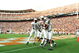 4 Sep 1999: Tommy Nash #19 of the Wyoming Cowboys celebrates his touchdown with teammates Wendell Montgomery #83 and Willie King #1 during a game against the Tennessee Volunteers at the Neyland Stadium in Knoxville, Tennessee. The Volunteers defeated the Cowboys 42-17.