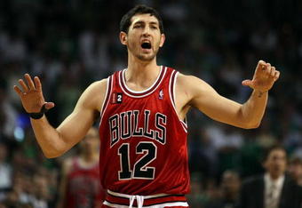 BOSTON - APRIL 28:  Kirk Hinrich #12 of the Chicago Bulls directs his teammates against the Boston Celtics in Game Five of the Eastern Conference Quarterfinals during the 2009 NBA Playoffs at TD Banknorth Garden on April 28, 2009 in Boston, Massachusetts. The Celtics defeated the Bulls 106-104 in overtime. NOTE TO USER: User expressly acknowledges and agrees that, by downloading and or using this photograph, User is consenting to the terms and conditions of the Getty Images License Agreement.  (Photo by Elsa/Getty Images)