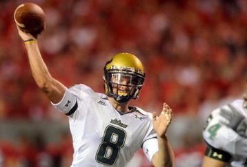 RALEIGH, NC - SEPTEMBER 27:  Quarterback Matt Grothe #8 of the South Florida Bulls throws a pass in the first quarter of the college football game against the North Carolina State Wolfpack at Carter-Finley Stadium on September 27, 2008 in Raleigh, North Carolina. (Photo by Steve Dykes/Getty Images)