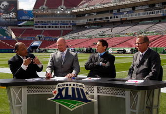 TAMPA, FL - FEBRUARY 01:  (L-R) The ESPN pregame show with host Mike Tirico and analysts Trent Dilfer, Steve Young and Ron Jaworski before Super Bowl XLIII on February 1, 2009 at Raymond James Stadium in Tampa, Florida.  (Photo by Jamie Squire/Getty Images)