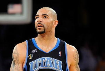 LOS ANGELES, CA - APRIL 21:  Carlos Boozer #5 of the Utah Jazz looks on in the second half against the Los Angeles Lakers in Game Two of the Western Conference Quarterfinals during the 2009 NBA Playoffs at Staples Center on April 21, 2009 in Los Angeles, California. NOTE TO USER: User expressly acknowledges and agrees that, by downloading and or using this photograph, User is consenting to the terms and conditions of the Getty Images License Agreement.  (Photo by Kevork Djansezian/Getty Images)