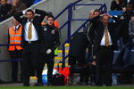 BOLTON, ENGLAND - MAY 16:  Phil Brown (L) Hull City manager and his assistant Brian Horton (R) react after a near miss during the Barclay's Premier League match between Bolton Wanderers and Hull City at the Reebok Stadium on May 16, 2009 in Bolton, England.  (Photo by Michael Steele/Getty Images)