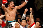 LAS VEGAS - MAY 02:  Manny Pacquiao of the Philippines celebrates after knocking out Ricky Hatton of England in the second round of their junior welterweight title fight at the MGM Grand Garden Arena May 2, 2009 in Las Vegas, Nevada.  (Photo by Ethan Miller/Getty Images)