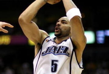SALT LAKE CITY - APRIL 25:  Carlos Boozer #5 of the Utah Jazz shoots in Game Four of the Western Conference Quarterfinals against the Los Angeles Lakers during the 2009 NBA Playoffs at Energy Solutions Arena on April 25, 2009 in Salt Lake City, Utah.  The Lakers won 108-94.  NOTE TO USER: User expressly acknowledges and agrees that, by downloading and/or using this Photograph, user is consenting to the terms and conditions of the Getty Images License Agreement.  (Photo by Otto Greule Jr/Getty Images)  