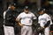 CLEVELAND - APRIL 10:  Cito Gaston #43 of the Toronto Blue Jays talks to his team on the mound against the Cleveland Indians in the eighth inning April 10, 2009 at Progressive Field in Cleveland, Ohio.  (Photo by Matt Sullivan/Getty Images)