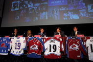ENGLEWOOD, CO - JULY 09:  Joe Sakic (C) is honored as he announces his retirement during a press conference at the Inverness Hotel on July 9, 2009 in Englewood, Colorado. (L-R) are Don Baizley, Debbie Sakic, Joe Sakic, Pierre Lacroix and Greg Sherman. Sakic played 20 years in the NHL with the same organization, the Quebec Nordiques from 1988-1995 and the Colorado Avalanche from 1995 to 2009.  (Photo by Doug Pensinger/Getty Images)