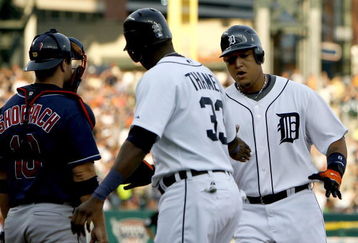 DETROIT - JULY 08:  Miguel Cabrera #24 of the Detroit Tigers celebrates a third inning home run with Marcus Thames #33 while playing the Cleveland Indians on July 8, 2008 at Comerica Park in Detroit, Michigan.  (Photo by Gregory Shamus/Getty Images)
