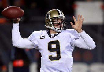 CHICAGO - DECEMBER 11:  Drew Brees #9 of the New Orleans Saints throws a pass against the Chicago Bears at Soldier Field on December 11, 2008 in Chicago, Illinois.  (Photo by Jonathan Daniel/Getty Images)