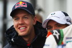 NURBURG, GERMANY - JULY 09:  Sebastian Vettel (L) of Germany and Red Bull Racing shares a joke with other German drivers in the paddock during previews to the German Formula One Grand Prix at Nurburgring on July 9, 2009 in Nurburg, Germany.  (Photo by Mark Thompson/Getty Images)