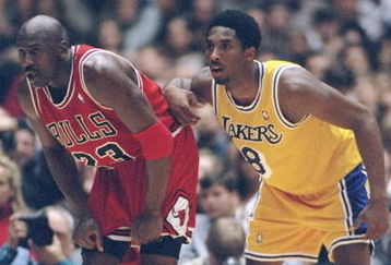 1 Feb 1998:  Guard Michael Jordan of the Chicago Bulls (left) and guard Kobe Bryant of the Los Angeles Lakers look on during a game at the Great Western Forum in Inglewood, California.  The Lakers won the game, 112-87. Mandatory Credit: Jed Jacobsohn  /Al