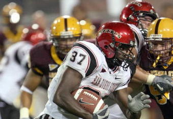 TEMPE, AZ - SEPTEMBER 15: Brandon Bornes #37 of the San Diego State Aztecs carries the ball during the game against the Arizona State Sun Devils on September 15, 2007 at Sun Devil Stadium in Tempe, Arizona.  (Photo by Stephen Dunn/Getty Images)