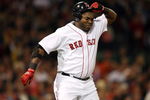 BOSTON - JULY 07:  David Ortiz #34 of the Boston Red Sox reacts after he flew out against the Oakland Athletics on July 7, 2009 at Fenway Park in Boston, Massachusetts.  (Photo by Elsa/Getty Images)