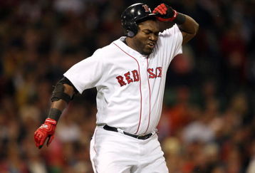 BOSTON - JULY 07:  David Ortiz #34 of the Boston Red Sox reacts after he flew out against the Oakland Athletics on July 7, 2009 at Fenway Park in Boston, Massachusetts.  (Photo by Elsa/Getty Images)