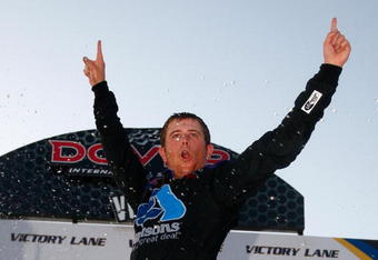 DOVER, DE - MAY 30:  Brian Scott, driver of the #16 Albertson's Toyota, celebrates in victory lane after winning the NASCAR Camping World Truck Series AAA Insurance 200 at Dover International Speedway on May 30, 2009 in Dover, Delaware.  (Photo by Jason Smith/Getty Images for NASCAR)