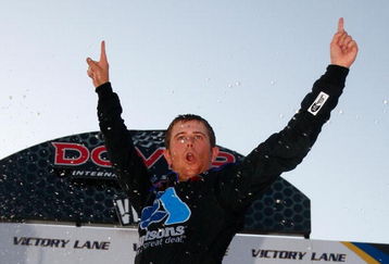DOVER, DE - MAY 30:  Brian Scott, driver of the #16 Albertson's Toyota, celebrates in victory lane after winning the NASCAR Camping World Truck Series AAA Insurance 200 at Dover International Speedway on May 30, 2009 in Dover, Delaware.  (Photo by Jason Smith/Getty Images for NASCAR)