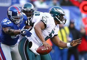 EAST RUTHERFORD, NJ - JANUARY 11:  Quarterback Donovan McNabb #5 of the Philadelphia Eagles scrambles in the pocket during the NFC Divisional Playoff Game against the New York Giants on January 11, 2009 at Giants Stadium in East Rutherford, New Jersey.  The Eagles defeated the Giants 23-11. (Photo by Al Bello/Getty Images)