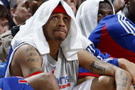 CLEVELAND - FEBRUARY 22: Allen Iverson #1 of the Detroit Pistons looks on from the bench during a loss to the Cleveland Cavaliers on February 22, 2009 at the Quicken Loans Arena in Cleveland, Ohio. Cleveland won the game 99-78. NOTE TO USER: User expressly acknowledges and agrees that, by downloading and or using this photograph, User is consenting to the terms and conditions of the Getty Images License Agreement.  (Photo by Gregory Shamus/Getty Images)
