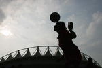 WUHAN, HUBEI - SEPTEMBER 22:  A Chinese girl goes up for a header before  the quarter final match of FIFA Women's World Cup China 2007 at Wuhan Sports Center Stadium on September 22, 2007 in Wuhan, China.  (Photo by Feng Li/Getty Images)