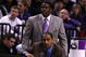 PORTLAND, OR - MARCH 21: Head coach Lorenzo Romar of the Washington Huskies kneels down as assistant coach Cameron Dollar stands behind him in the second half against the Purdue Boilermakers during the second round of the NCAA Division I Men's Basketball Tournament at the Rose Garden on March 21, 2009 in Portland, Oregon. (Photo by Jonathan Ferrey/Getty Images)