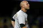 LOS ANGELES - JUNE 18:   Matt Holliday #5 of the Oakland Athletics takes the field after striking out to end the eighth inning against the Los Angeles Dodgers on June 18, 2009 at Dodger Stadium in Los Angeles, California. The Dodgers won 3-2.  (Photo by Stephen Dunn/Getty Images)