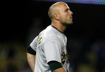 LOS ANGELES - JUNE 18:   Matt Holliday #5 of the Oakland Athletics takes the field after striking out to end the eighth inning against the Los Angeles Dodgers on June 18, 2009 at Dodger Stadium in Los Angeles, California. The Dodgers won 3-2.  (Photo by Stephen Dunn/Getty Images)