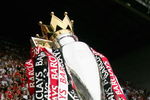 WIGAN, UNITED KINGDOM - MAY 11:  Manchester United Manager Sir Alex Ferguson holds the Barclays Premier League trophy aloft at the end of the Barclays Premier League match between Wigan Athletic and Manchester United at The JJB Stadium on May 11, 2008 in Wigan, England.  (Photo by Alex Livesey/Getty Images)