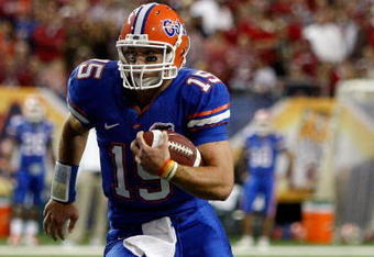 ATLANTA - DECEMBER 06:  Quarterback Tim Tebow #15 of the Florida Gators runs against the Alabama Crimson Tide during the SEC Championship on December 6, 2008 at the Georgia Dome in Atlanta, Georgia. The Gators defeated the Crimson Tide 31-20.  (Photo by Chris Graythen/Getty Images)