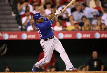 ANAHEIM, CA - JULY 08:  Andruw Jones #25 of the Texas Rangers hits his third home run of the game against the Los Angeles Angels of Anaheim in the fifth inning at Angel Stadium July 8, 2009 in Anaheim, California.   The Rangers won 8-1.   (Photo by Stephen Dunn/Getty Images)