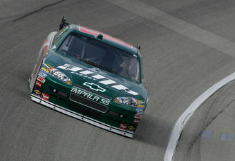 JOLIET, IL - JULY 09:  Dale Earnhardt Jr. drives the #88 AMP Energy/National Guard Chevrolet during practice for the NASCAR Sprint Cup Series LifeLock.com 400 at Chicagoland Speedway on July 9, 2009 in Joliet, Illinois.  (Photo by Todd Warshaw/Getty Images)