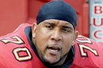 TAMPA, FL -  DECEMBER 30: Tackle Donald Penn #70 of the Tampa Bay Buccaneers watches play against the Carolina Panthers at Raymond James Stadium  on December 30, 2007 in Tampa, Florida.  The Panthers won 31 - 23. (Photo by Al Messerschmidt/Getty Images)