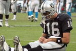 OAKLAND, CA - NOVEMBER 09: Andrew Walter #16 of the Oakland Raiders sits on the ground after being injured against the Carolina Panthers during an NFL game on November 9, 2008 at the Oakland-Alameda County Coliseum in Oakland, California. (Photo by Jed Jacobsohn/Getty Images)