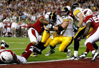 TAMPA, FL - FEBRUARY 01:  Quarterback Ben Roethlisberger #7 of the Pittsburgh Steelers dives into the endzone for a touchdown in the first quarter but the play was ruled no touchdown on a coaches' challenge against the Arizona Cardinals during Super Bowl XLIII on February 1, 2009 at Raymond James Stadium in Tampa, Florida.  (Photo by Streeter Lecka/Getty Images)