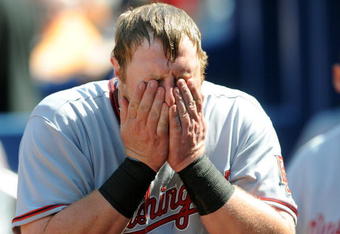 ATLANTA - APRIL 12: Infielder Adam Dunn #44 of the Washington Nationals seeks relief from the heat before play against the Atlanta Braves April 12, 2009 at Turner Field in Atlanta, Georgia.  (Photo by Al Messerschmidt/Getty Images) 