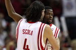 HOUSTON - MAY 10:  Guard Aaron Brooks #0 celebrates a three-point shot with Luis Scola #4 of the Houston Rockets against the Los Angeles Lakers in Game Four of the Western Conference Semifinals during the 2009 NBA Playoffs at Toyota Center on May 10, 2009 in Houston, Texas. NOTE TO USER: User expressly acknowledges and agrees that, by downloading and or using this photograph, User is consenting to the terms and conditions of the Getty Images License Agreement.  (Photo by Ronald Martinez/Getty Images)