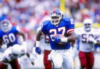 10 Nov 1991: Running back Rodney Hampton of the New York Giants runs with the ball during a game against the Phoenix Cardinals at Sun Devil Stadium in Tempe, Arizona. The Giants won the game 21-14.