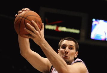 EAST RUTHERFORD, NJ - MARCH 04:  Ryan Anderson #20 of the New Jersey Nets grabs a rebound against the Boston Celtics during their game on March 4th, 2009 at The Izod Center in East Rutherford, New Jersey.  NOTE TO USER: User expressly acknowledges and agrees that, by downloading and/or using this Photograph, user is consenting to the terms and conditions of the Getty Images License Agreement. Photo By Al Bello/Getty Images  (Photo by Al Bello/Getty Images)