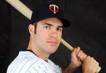 FORT MYERS, FL - FEBRUARY 23: Joe Mauer #7 of the Minnesota Twins poses during photo day at the Twins spring training complex on February 23, 2008 in Fort Myers, Florida. (Photo by Rob Tringali/Getty Images)