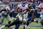 ST. LOUIS, MO - SEPTEMBER 14:  Ahmad Bradshaw #44 of the New York Giants rushes against the St. Louis Rams at the Edward Jones Dome on September 14, 2008 in St. Louis, Missouri.  The Giants beat the Rams 41-13.   (Photo by Dilip Vishwanat/Getty Images)